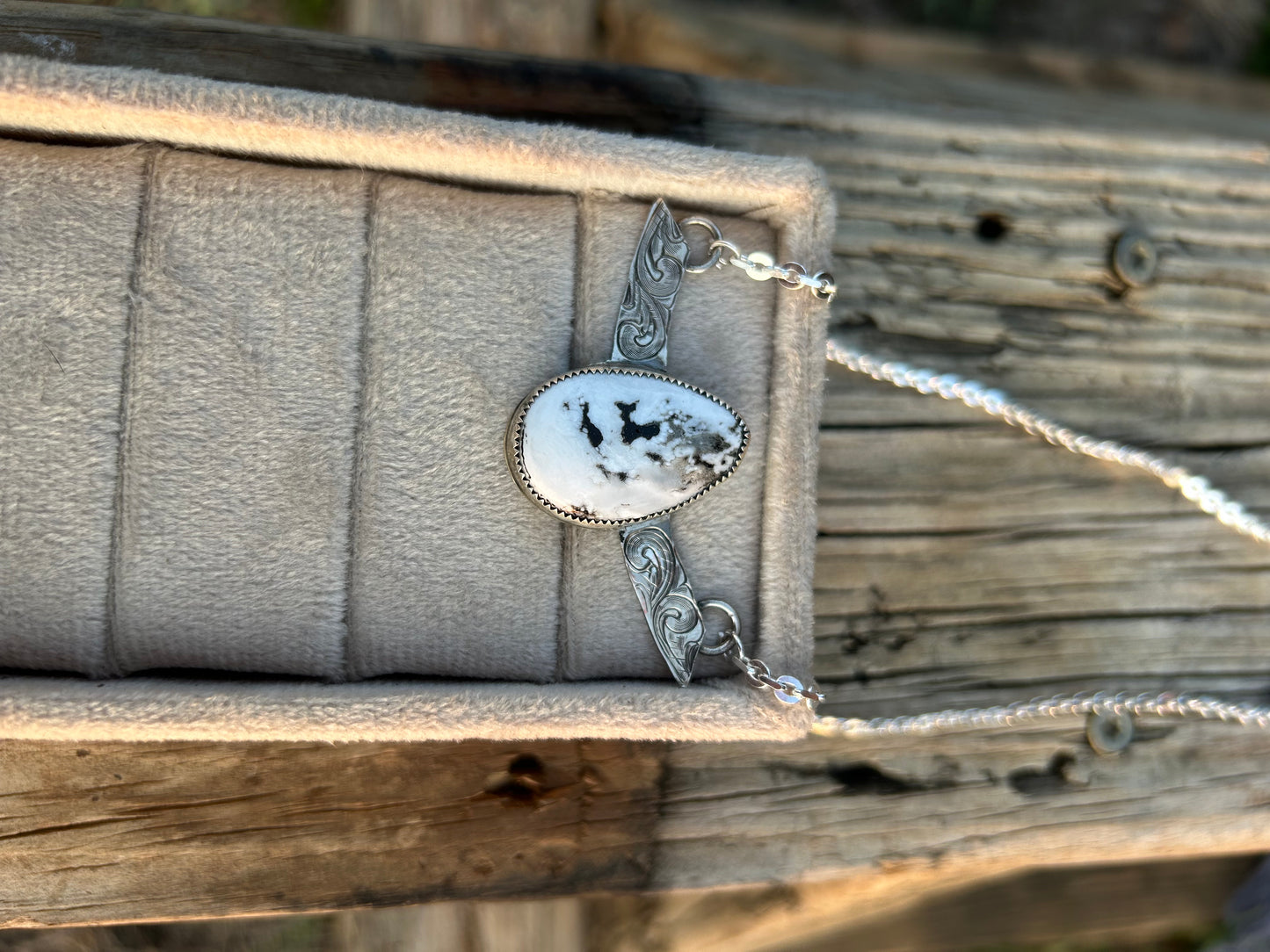 Engraved White Buffalo Pendant and Chain.