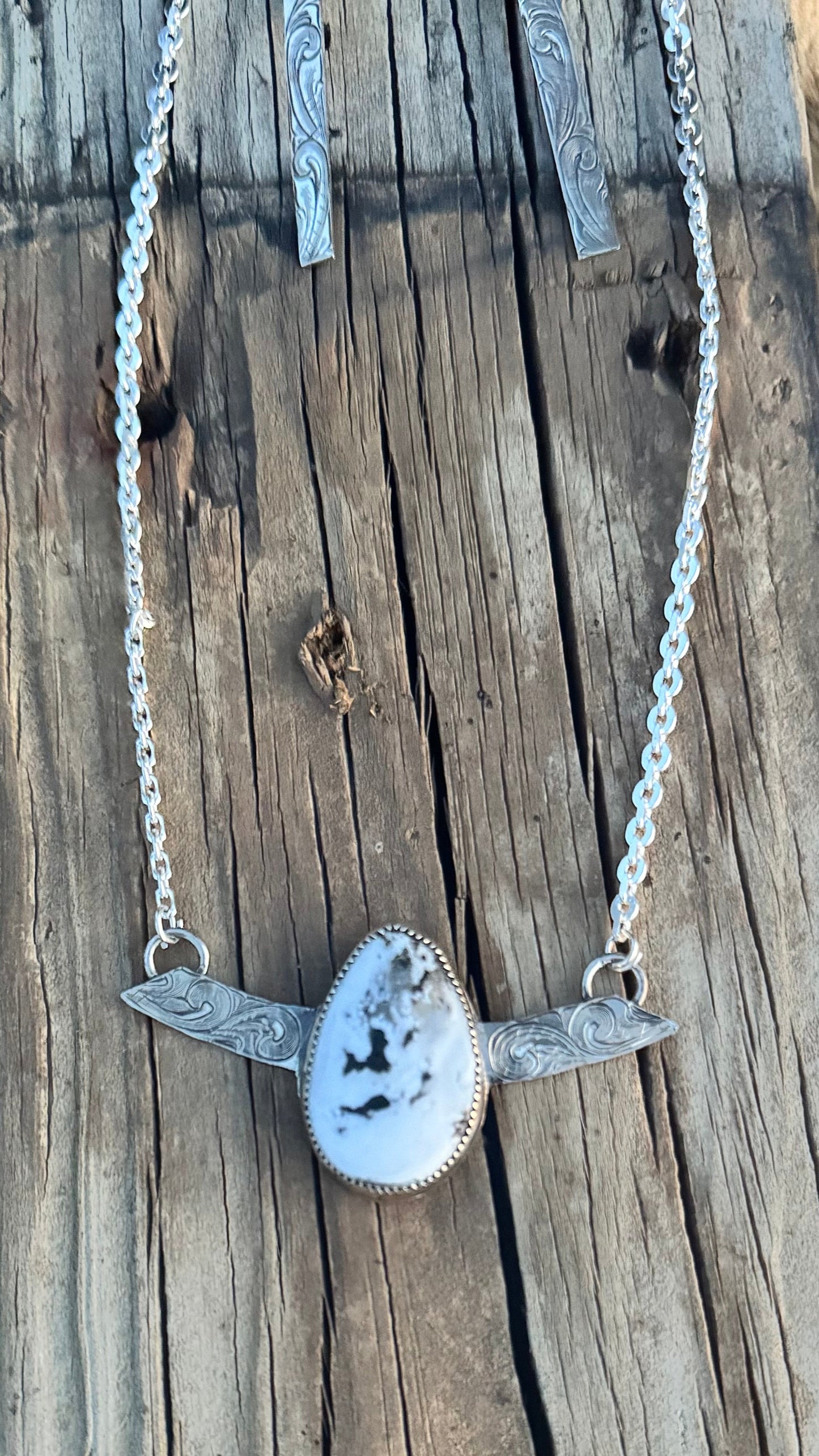 Engraved White Buffalo Pendant and Chain.